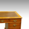 Edwardian large oak pedestal desk detail top