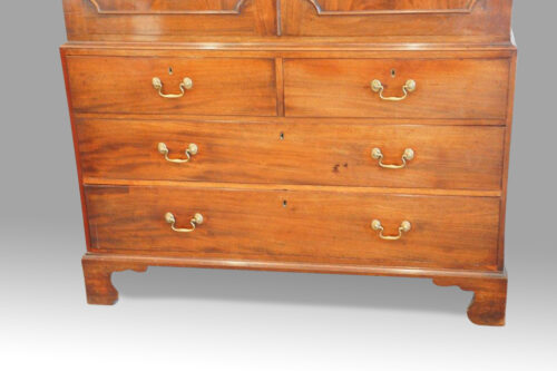 George III mahogany linen press base drawers