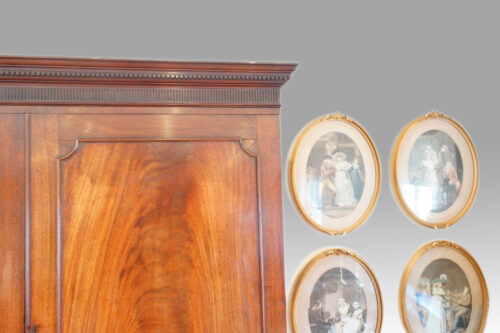 George III mahogany linen press door panel detail