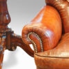 Pair of Edwardian leather club chair scroll arm