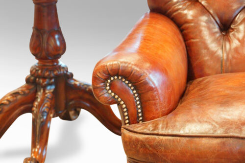 Pair of Edwardian leather club chair scroll arm