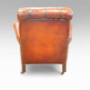 Pair of Edwardian leather club chair rear