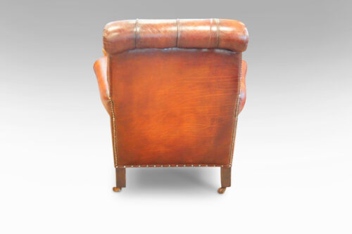 Pair of Edwardian leather club chair rear