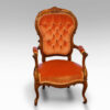 Victorian open-arm button-back chair