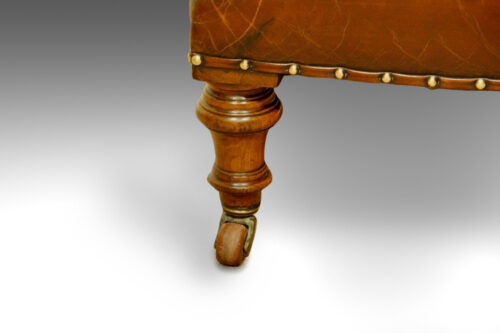 Victorian leather button-back reading chair leg