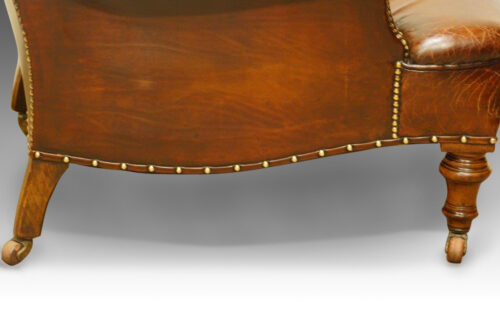 Victorian leather button-back reading chair detail