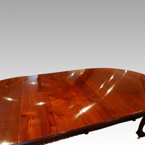 Antique dining table in mahogany
