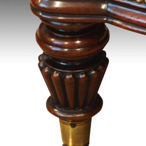 William IV mahogany leather reading chair leg detail