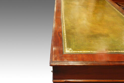 Edwardian mahogany pedestal desk edge