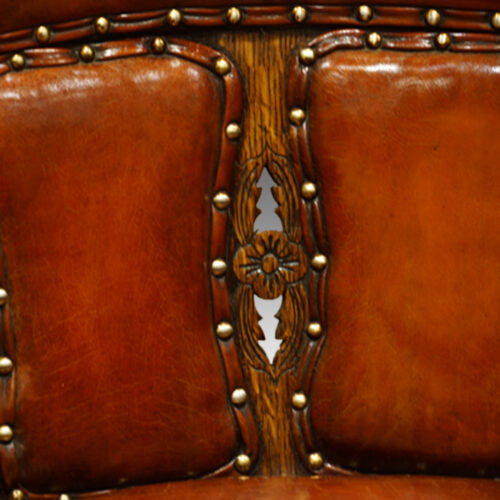 Edwardian oak and leather desk chair panel