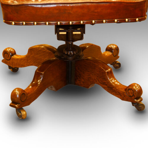 Edwardian oak and leather desk chair base