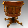 Edwardian oak and leather desk chair rear