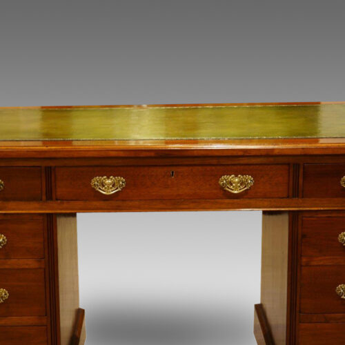 Edwardian walnut pedestal desk central drawer
