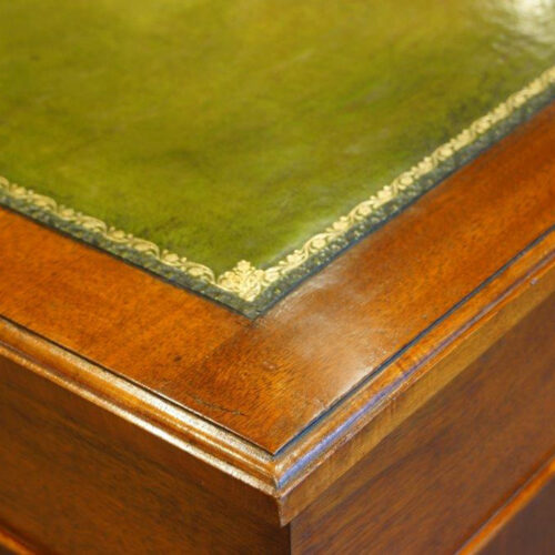 Edwardian walnut small pedestal desk gilt tooling