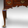 Georgian oak lowboy front leg