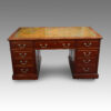 Edwardian mahogany paneled pedestal desk
