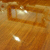 Regency twin pillar mahogany dining table surface
