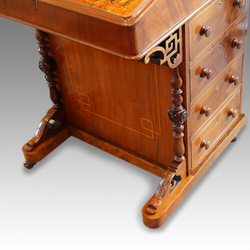 Victorian inlaid walnut Davenport desk front leg