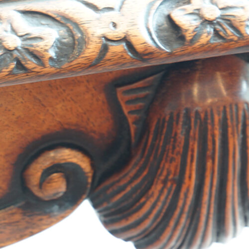 Carved shell motif
