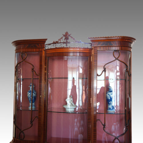Edwardian claw and ball display cabinet top detail