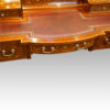 Edwardian inlaid mahogany writing desk bow front