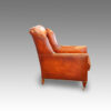 Pair of Edwardian leather club chairs side view