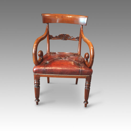 Pair of William IV mahogany scroll arm armchair