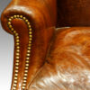 Antique wing-chair brass studwork