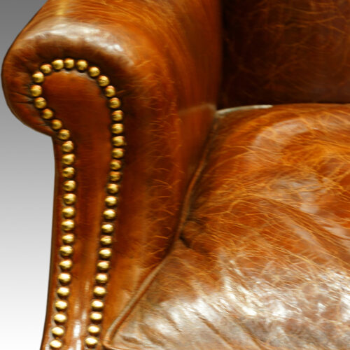 Antique wing-chair brass studwork