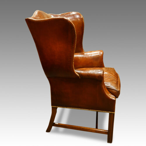 Antique leather-wing chairs side