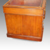 Antique pedestal desk side view