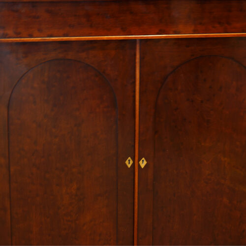 William IV 'plum pudding' mahogany chiffonier doors
