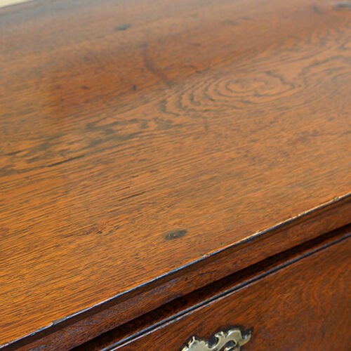Antique oak pot-board dresser base top detail