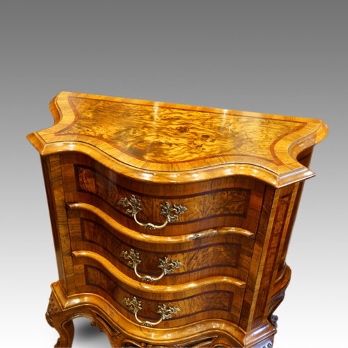 Pair of Antique serpentine bedside cabinets top