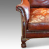 Antique club chair arm
