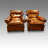 Pair of Edwardian club easy chairs