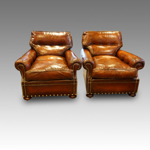 Pair of Edwardian club easy chairs