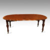 Victorian mahogany extending circular dining table side
