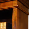 Edwardian walnut tall open bookcase edge