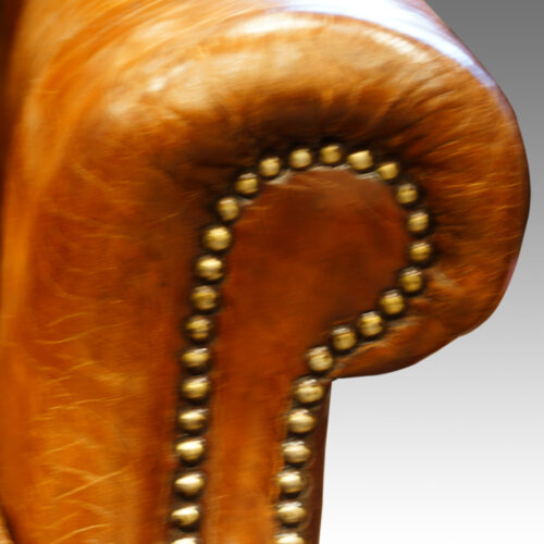 Pair of Edwardian club chairs arm