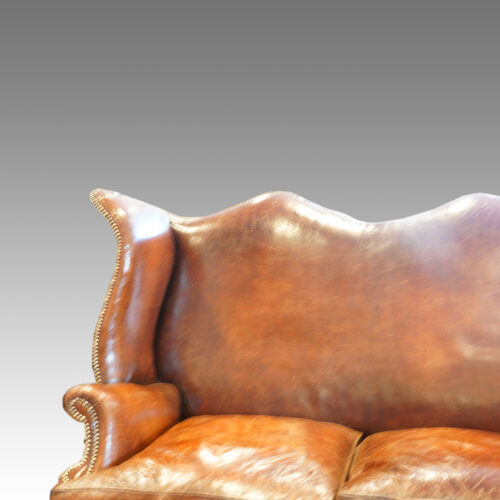 Wing sofa camel back