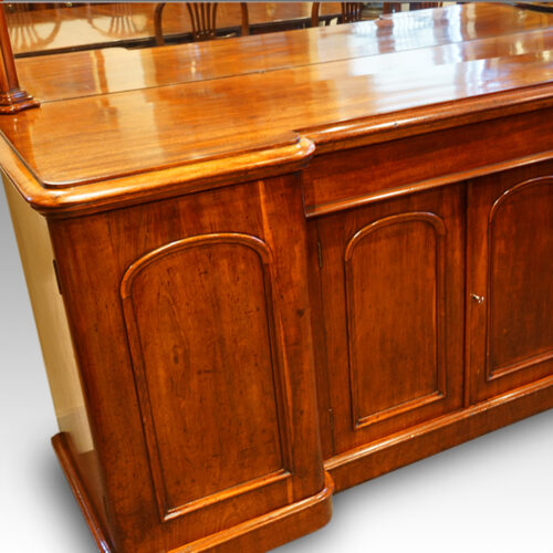 Antique cupboard door on Victorian sideboard