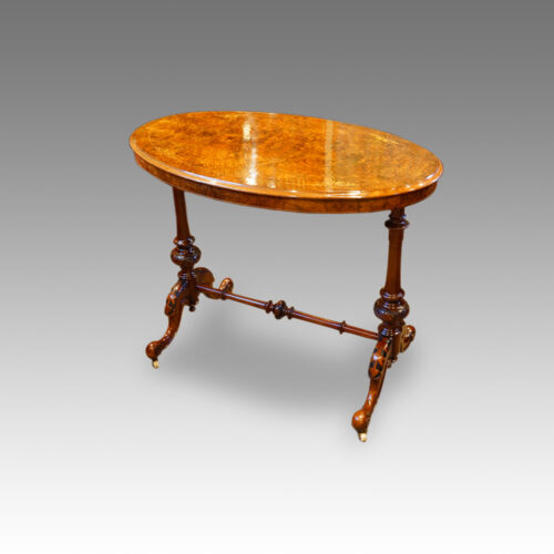 Victorian oval inlaid walnut stretcher table