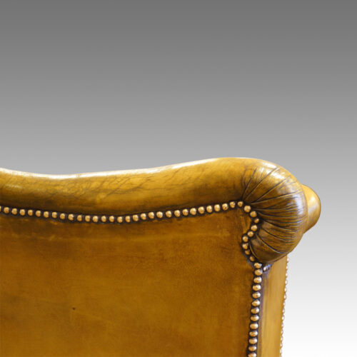 Edwardian leather reading easy chair,