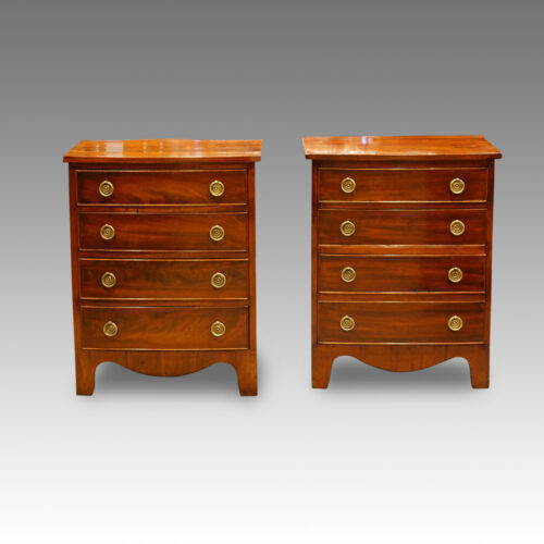 Pair of Edwardian bow fronted mahogany bedside chests