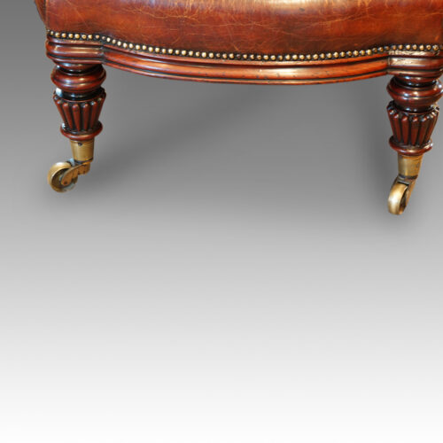Antique reading chair front legs