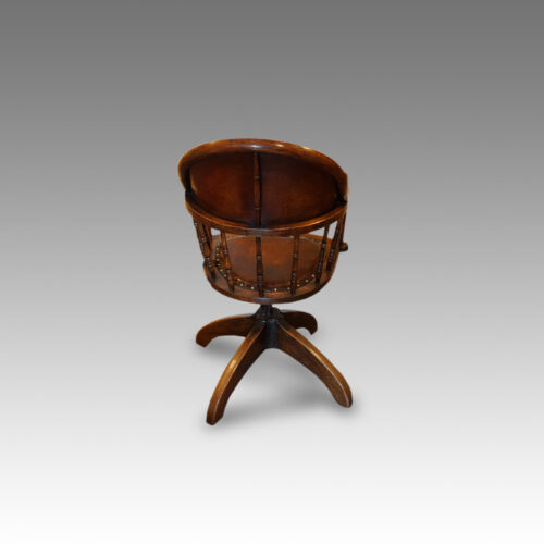 Rear of oak swivel desk chair