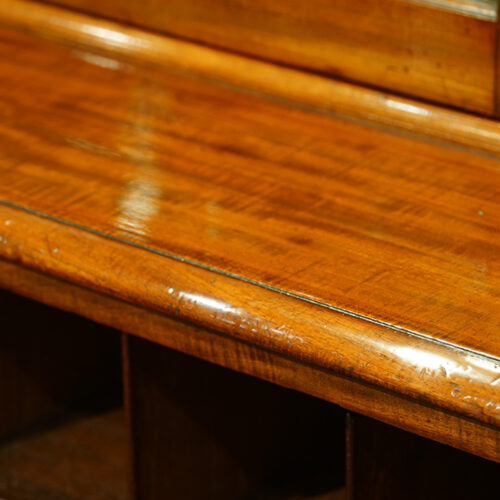 Surface of mahogany bookcase