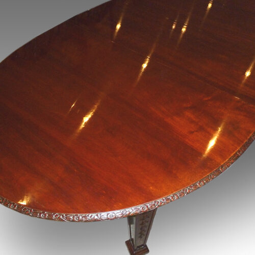 Edwardian mahogany Waring & Gillow dining table