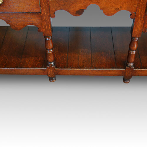 Boarded base of dresser